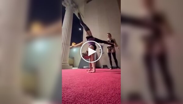 Красивый и сложный трюк в исполнении гимнасток
